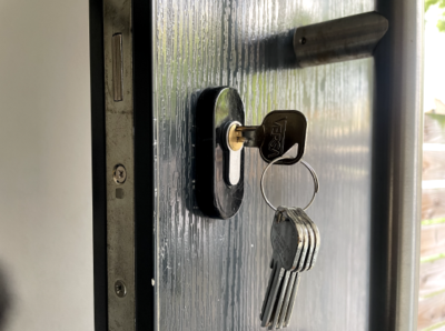 a professional locksmith has installed complex lock mechanism
